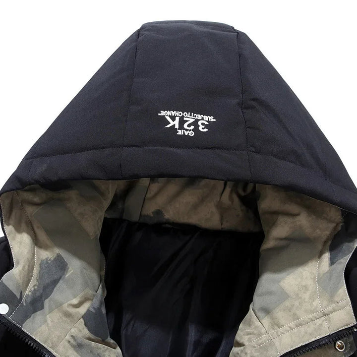 Stijlvol heren puffer jack met capuchon, perfect voor een casual winterlook. Comfortabele en warme jas.