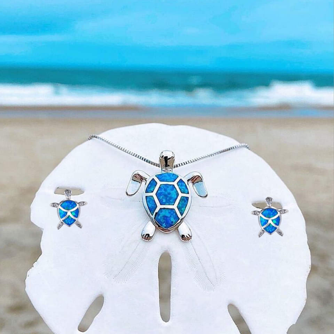 Zilveren zeeschildpad sieraden set voor dames, compleet met trendy halsketting en bijpassende oorbellen.