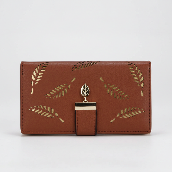 Dames leren portemonnee met elegant bladmotief. Combineert stijl, compactheid en duurzaamheid.