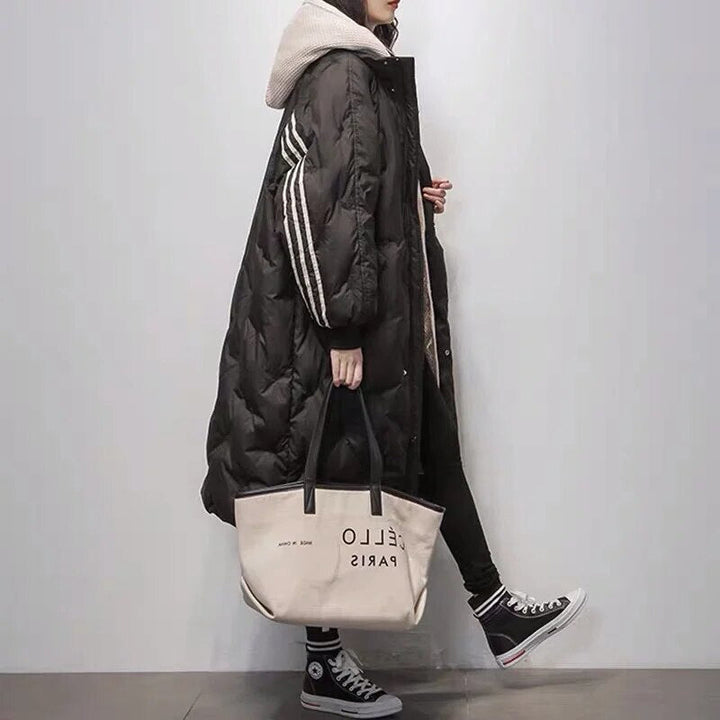 Elegante lange winterjas voor dames, gevoerd voor extra warmte en een modieuze uitstraling in de winterkou.