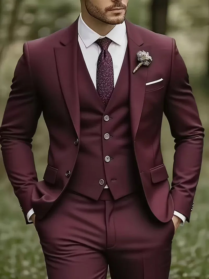 Een compleet herenpak, driedelig slim fit, met een luxueuze glanzende finish voor speciale dagen.