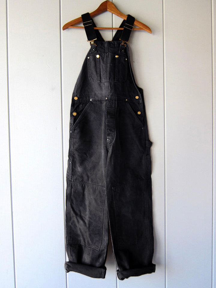Unisex werkoveralls: stevig canvas materiaal met praktische zakken. Essentieel voor gereedschap en benodigdheden.