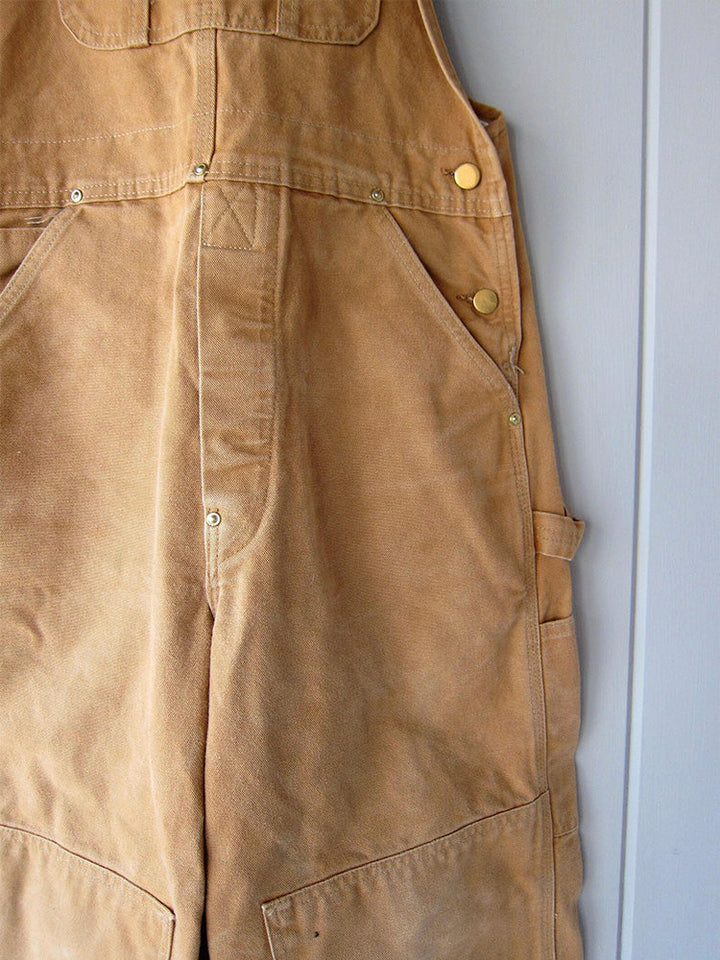 Ademende unisex canvas werkoveralls, perfect als complete werkoutfit. Duurzaam voor zware werkzaamheden.