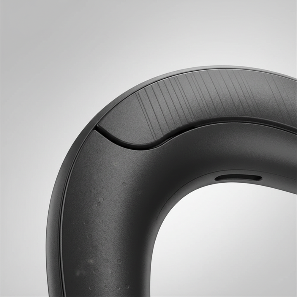 Zwarte Boneacoustic botgeleiding sport headset, draadloos en comfortabel voor veilig buiten sporten.