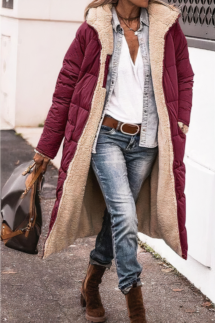 Dames dubbelzijdige parka Nova gedragen met de effen kant naar buiten. Stijlvolle, warme winterjas voor dames.