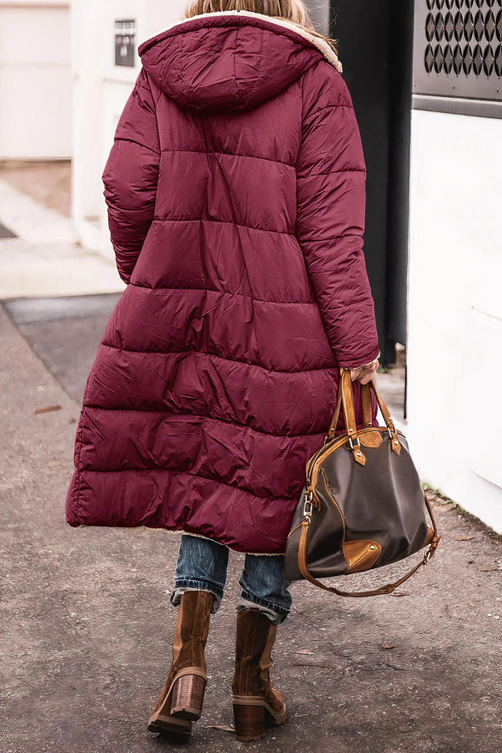 Hoogwaardige dames dubbelzijdige parka Nova. Duurzame warme winterjas met teddyvoering en stijlvol design.