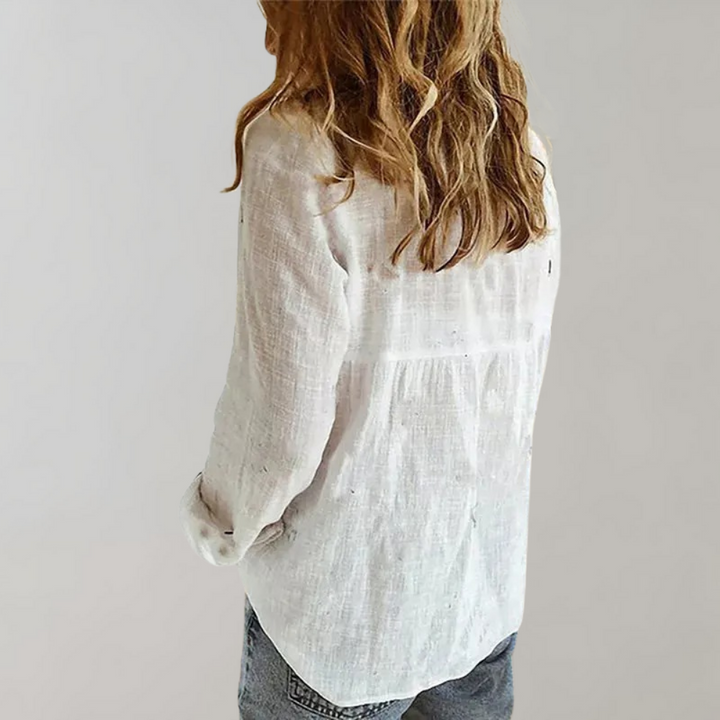 Chique damesblouse met elegante knoopsluiting, modieus voor zowel casual als geklede gelegenheden.