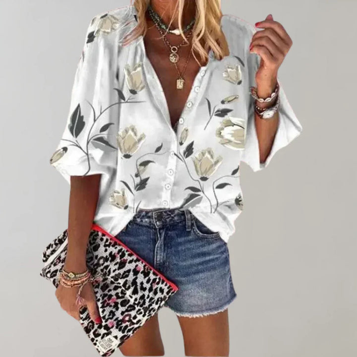 Comfortabele Hoymans damesblouse met frisse bloemenprint, lange mouwen voor een veelzijdige zomerse outfit.