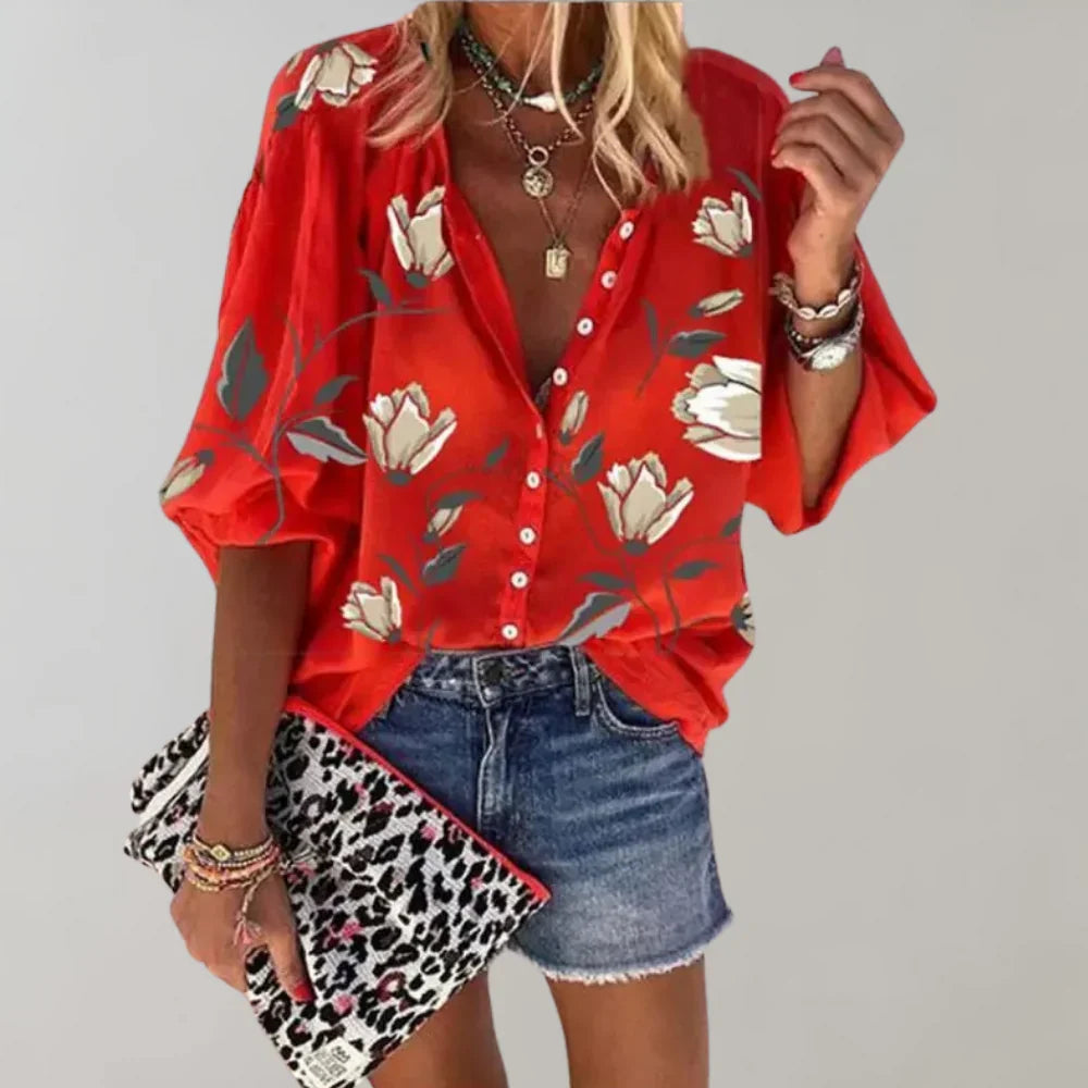 Elegante dames zomerblouse met bloemenprint, lange mouwen; comfortabel en stijlvol voor vrouwelijke looks.