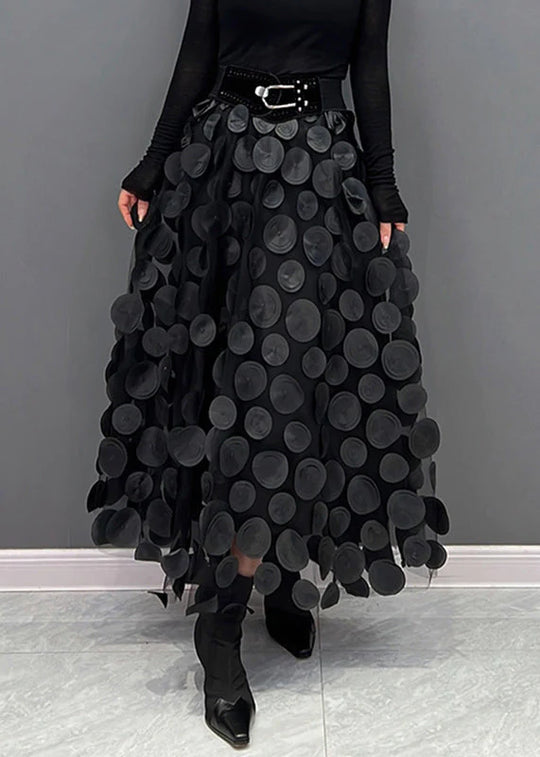 Maëlle zwierige damesrok, een stijlvolle midi met klassieke polkadot print. Veelzijdig en modieus.