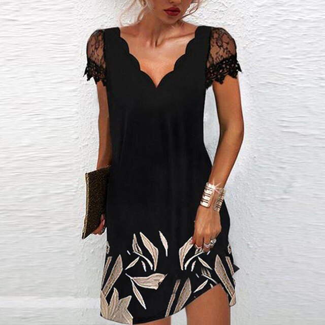 Damesmode zomerjurk met prachtige details, v-hals en comfortabele stretchstof.