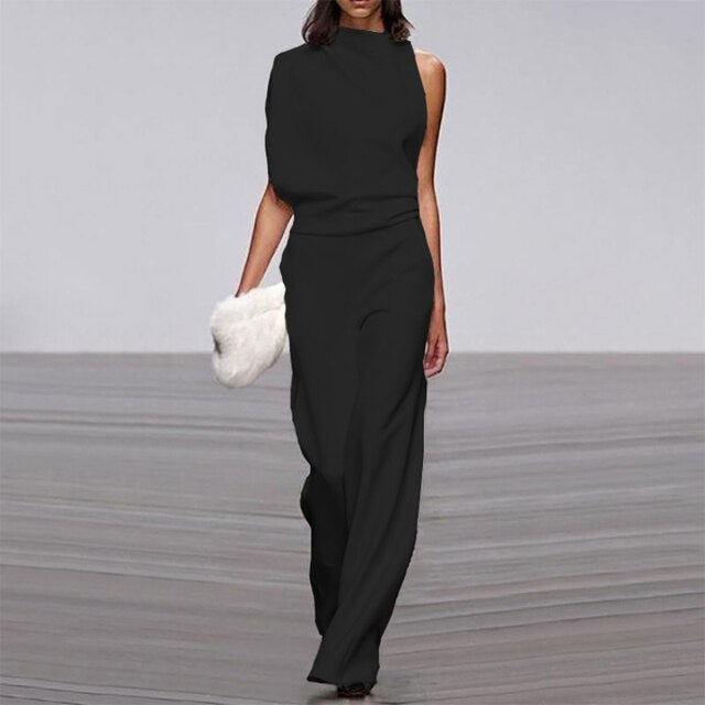 Stijlvolle Aria jumpsuit voor dames, perfect voor feestjes of een chique zomeravond. Comfortabele wijde pijpen.