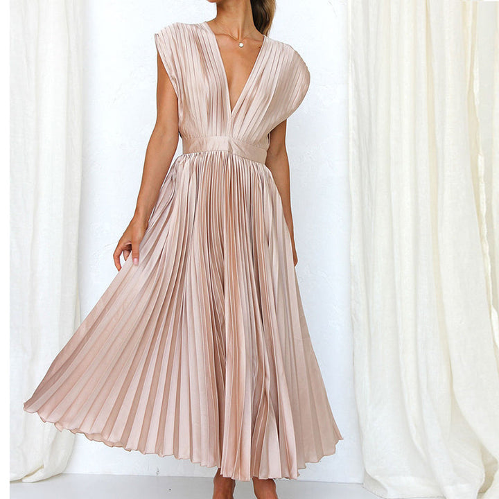 Veelzijdige dames maxi jurk met V-hals en open rug. Geschikt als casual zomerjurk of als chique feestjurk.