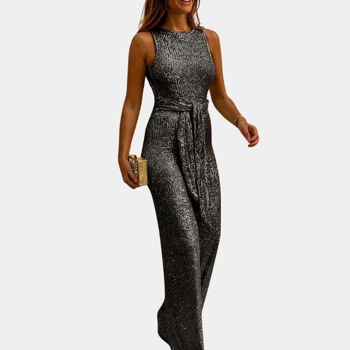Feestelijke dames glitterjumpsuit met elegante uitstraling, geschikt voor avondkleding en speciale gelegenheden. Stijlvol.