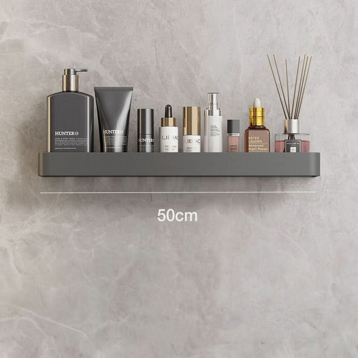 Multifunctionele boorvrije badkamer wandplank met geïntegreerde handdoekhouder voor opslag.