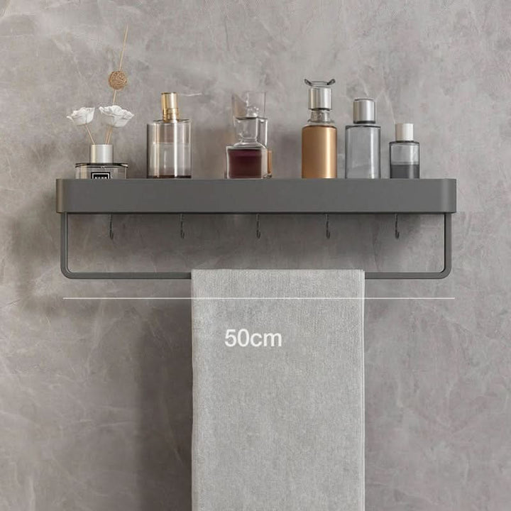 Elegante boorvrije wandplank met handdoekhouder voor moderne badkamer organisatie.