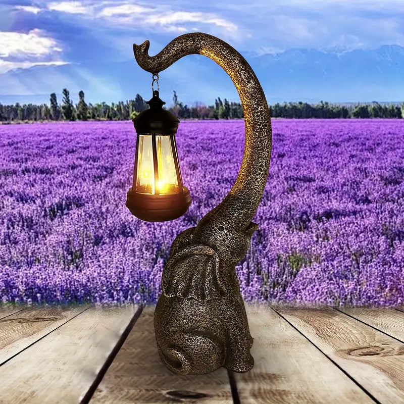 Decoratieve olifant lamp, een uniek gelukssymbool en sfeervol geschenk voor huis en tuin liefhebbers.