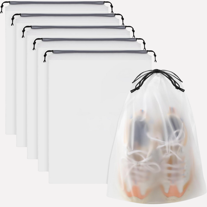 Set transparante trekkoord tassen, ideaal voor compacte organisatie van schoenen in een reistas of koffer.