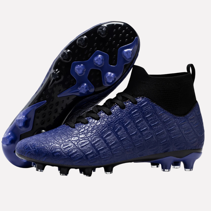 Achterkant heren voetbalschoenen met versterkte hiel & hoge enkel, voor extra stabiliteit en ondersteuning tijdens voetbal.