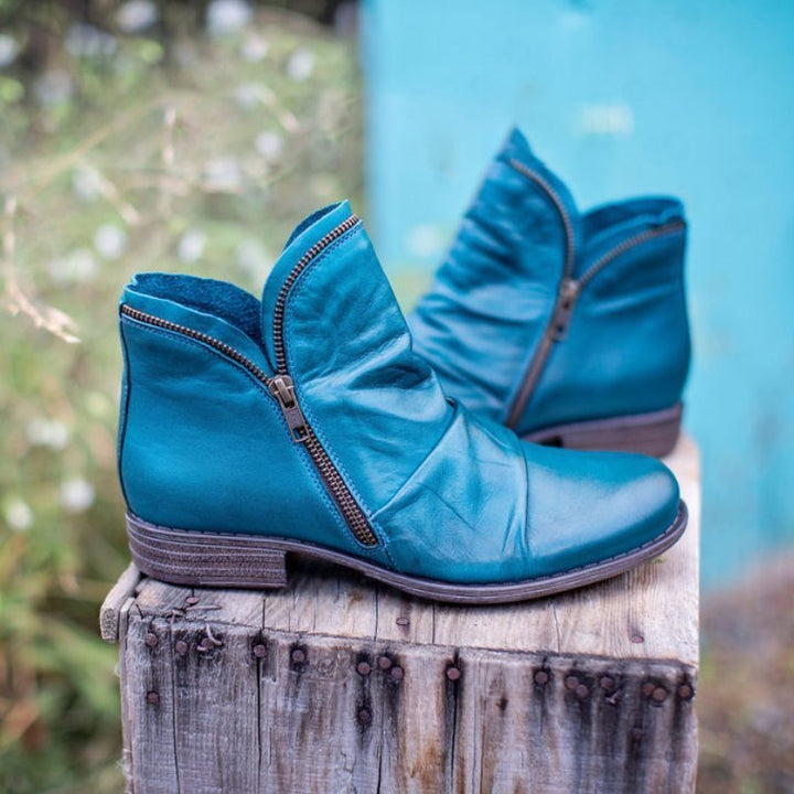 Stijlvolle dames enkelboots met stevige rubberen zool, voor optimale grip en warmte tijdens de herfst/winter.