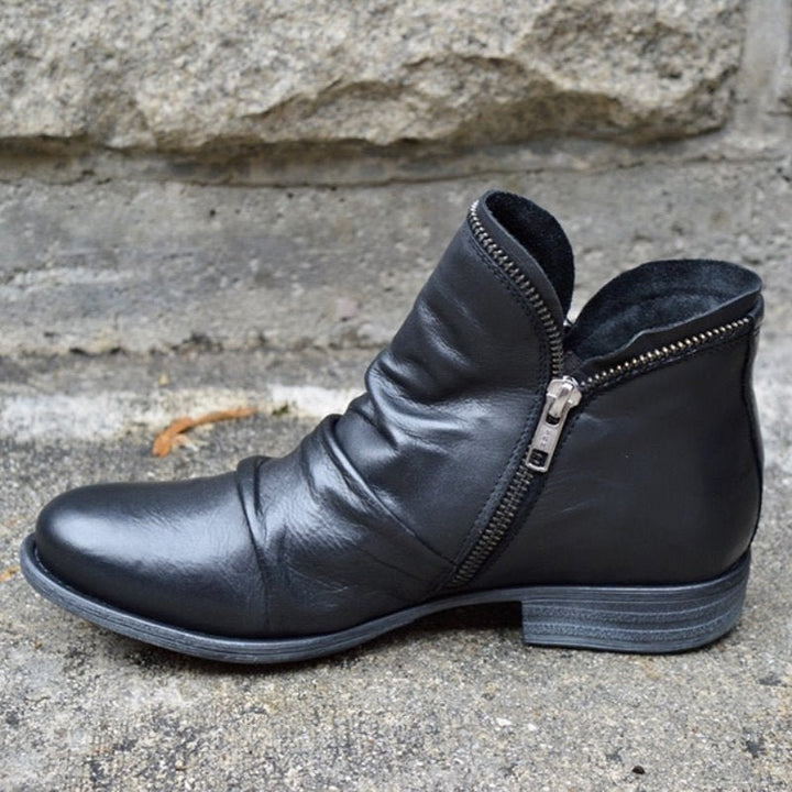 Dames enkelboots met robuuste gripzool, ideaal voor herfst & winter. Comfortabel en stijlvol voor dagelijks gebruik.