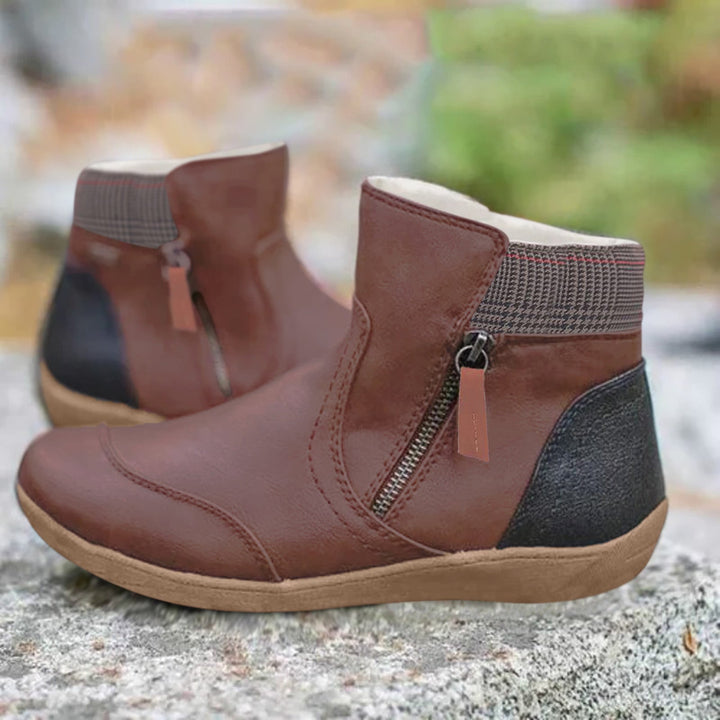 Damesschoenen: comfortabele enkellaarsjes met voetboogondersteuning en antislip zool voor najaar.