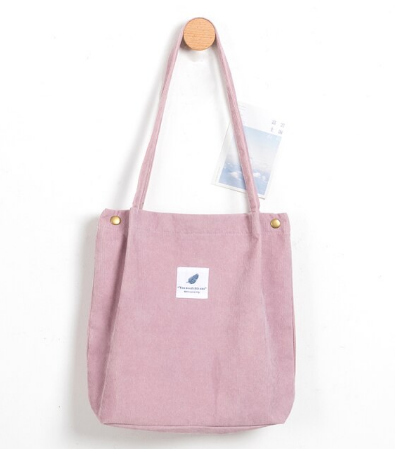 Praktische corduroy draagtas voor dames, stijlvol en ruim voor alle benodigdheden.