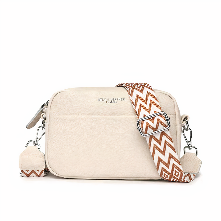Compacte multifunctionele leren dames tas; perfect als crossbody voor onderweg, biedt comfort en stijl.