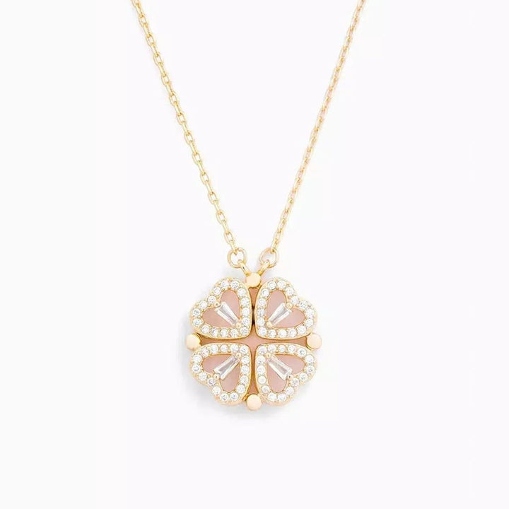 Dames RVS ketting met hart en klavertje vier hanger, bezet met glinsterende zirkonia.