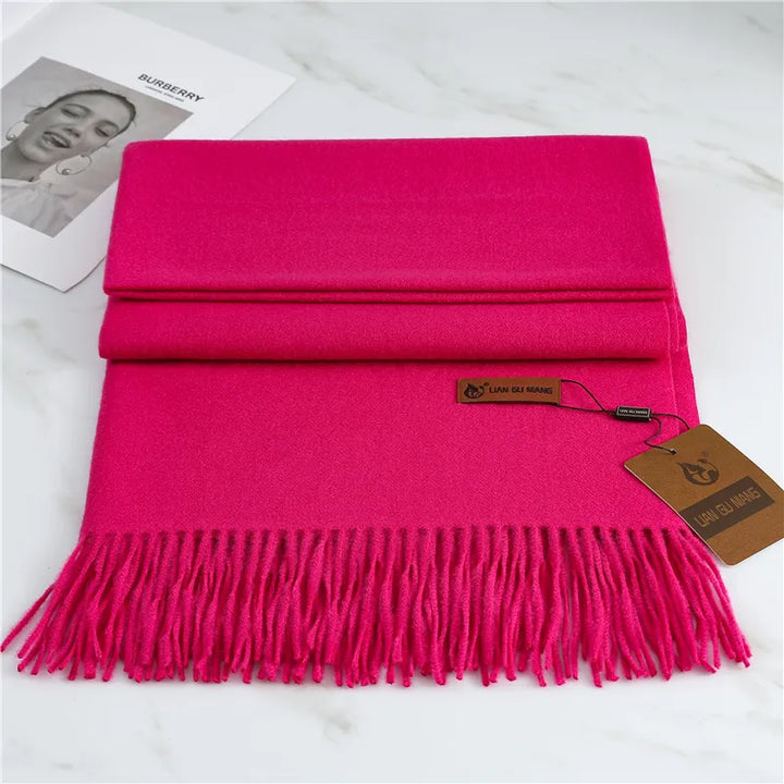 Elegante dames winter sjaal van kasjmier met stijlvolle kwastjes.