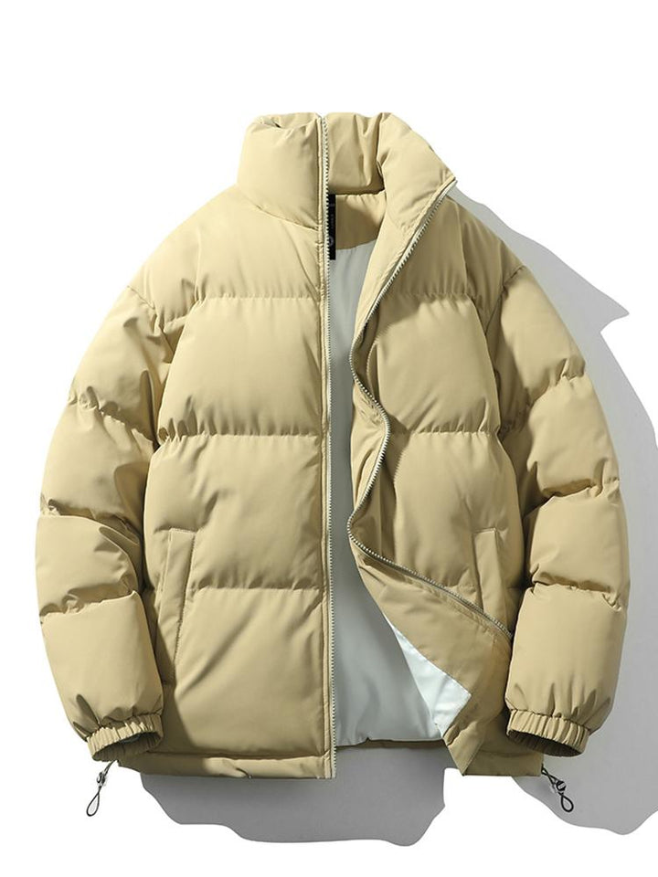 Stijlvolle heren oversized pufferjack, gewatteerd voor optimale warmte in de winter.