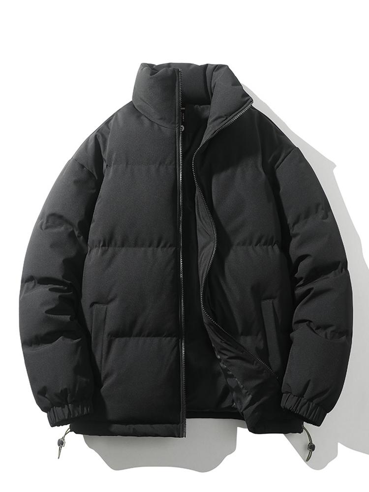 Trendy heren winter bovenkleding: oversized korte pufferjas, gewatteerd en stijlvol.