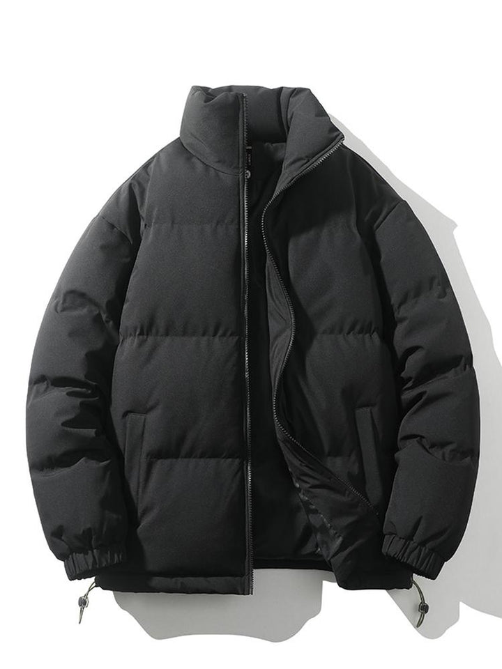 Trendy heren winter bovenkleding: oversized korte pufferjas, gewatteerd en stijlvol.