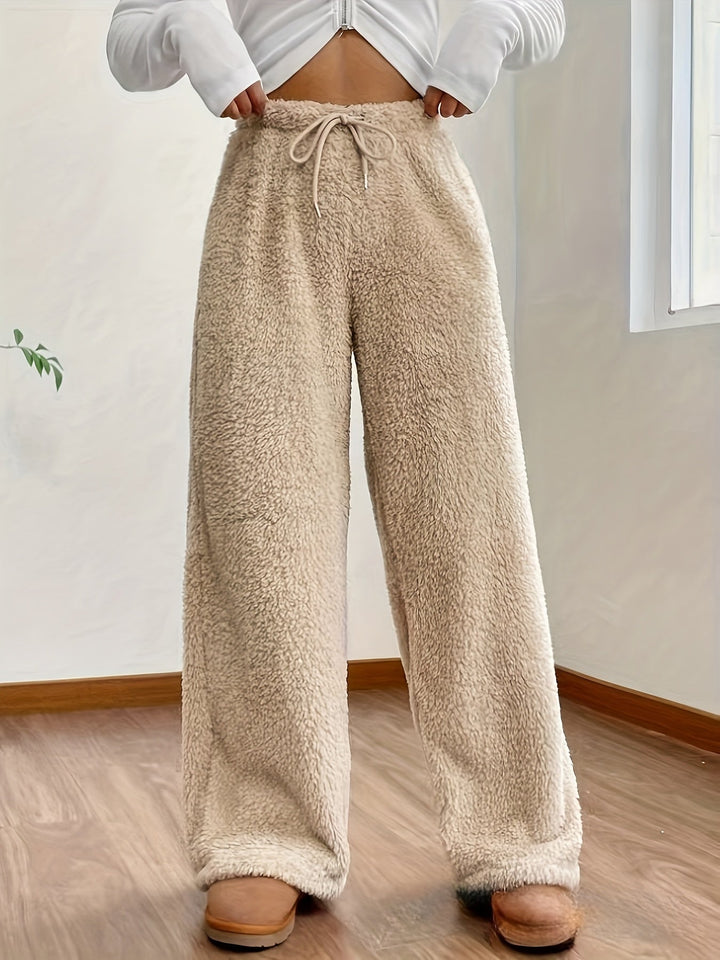 Zachte teddy sherpa loungebroek Noémie voor dames, ultiem comfort en warmte thuis.