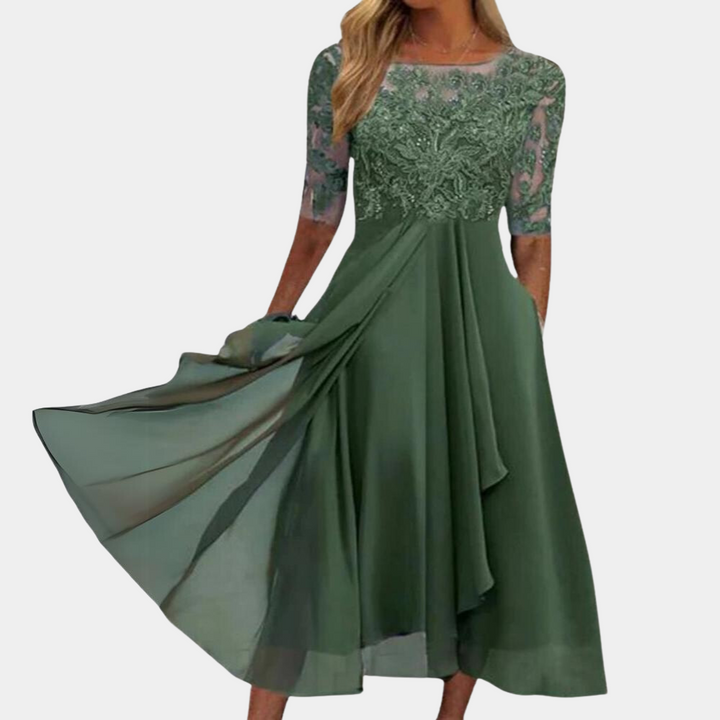 Chique dames avondjurk, lange maxi-jurk met korte mouw. Elegante feestjurk voor zomerse avonden en speciale gelegenheden.