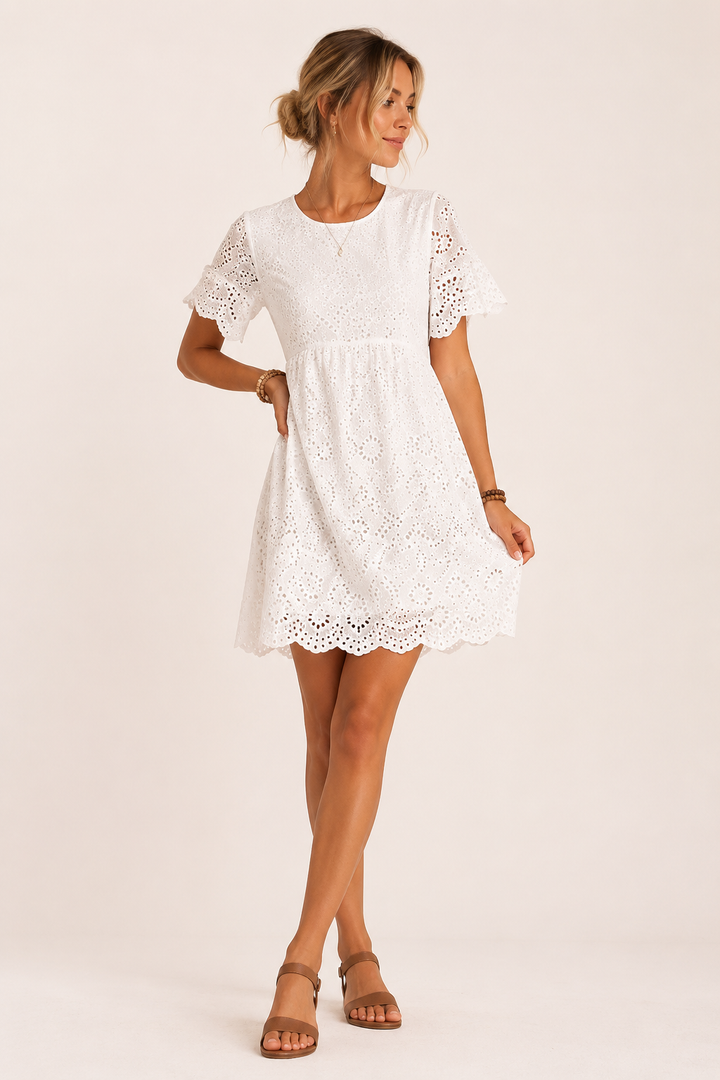 Elegante witte dames geborduurde midi-jurk met V-hals en hoge taille, perfect voor zomerse feesten.