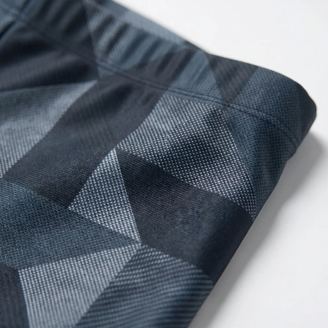 Strakke pasvorm heren zwemshorts, getailleerd en sportief, perfect voor een zomerse stranddag.