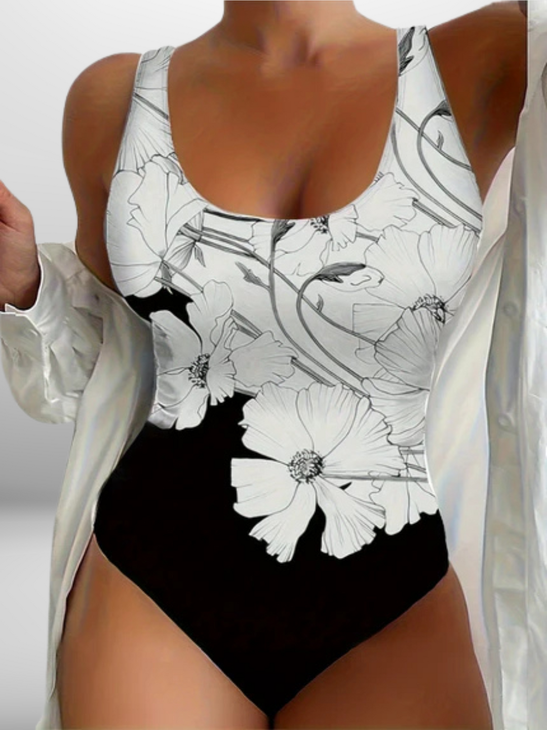Flatterend dames badpak met shaping effect en kleurrijke bloemenprint, perfecte zwemkleding voor de zomer.