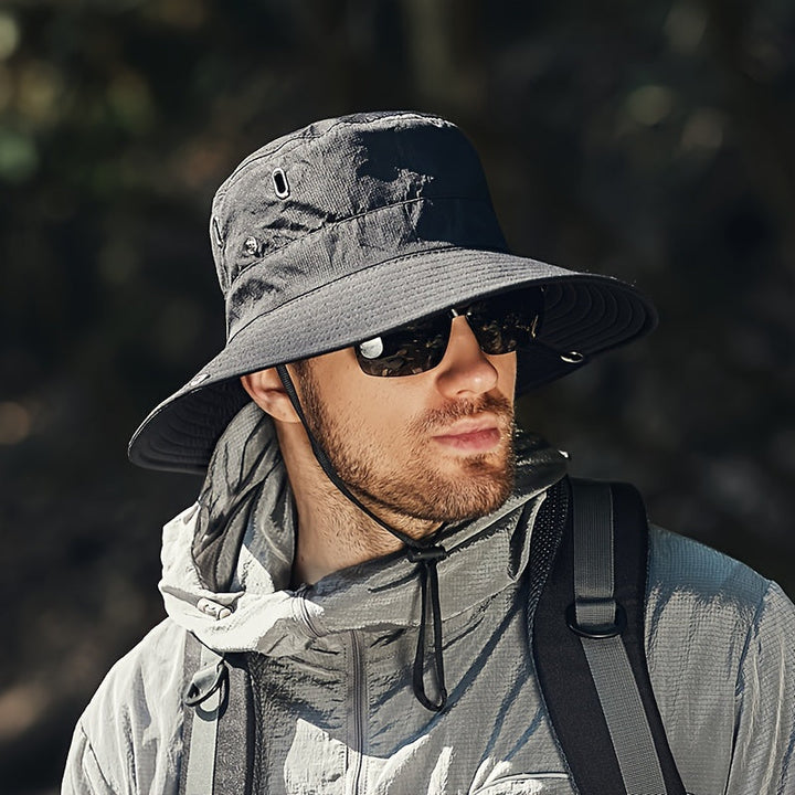 Unisex ademende zonnehoed met brede rand voor UV-bescherming. Ideaal voor zomerse outdoor activiteiten zoals wandelen.