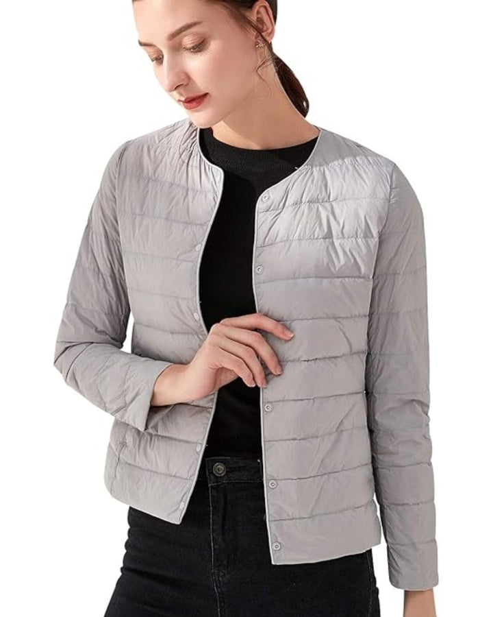 Stijlvol kort dames donsjack, effen kleur. Ideale warme winterjas voor dagelijks gebruik.