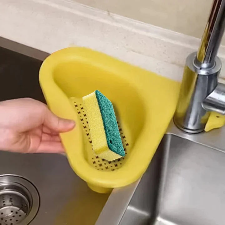 Oranje keukenhulpje: handige zeef voor gootsteen, perfect voor voedselresten en waterafvoer in de keuken.