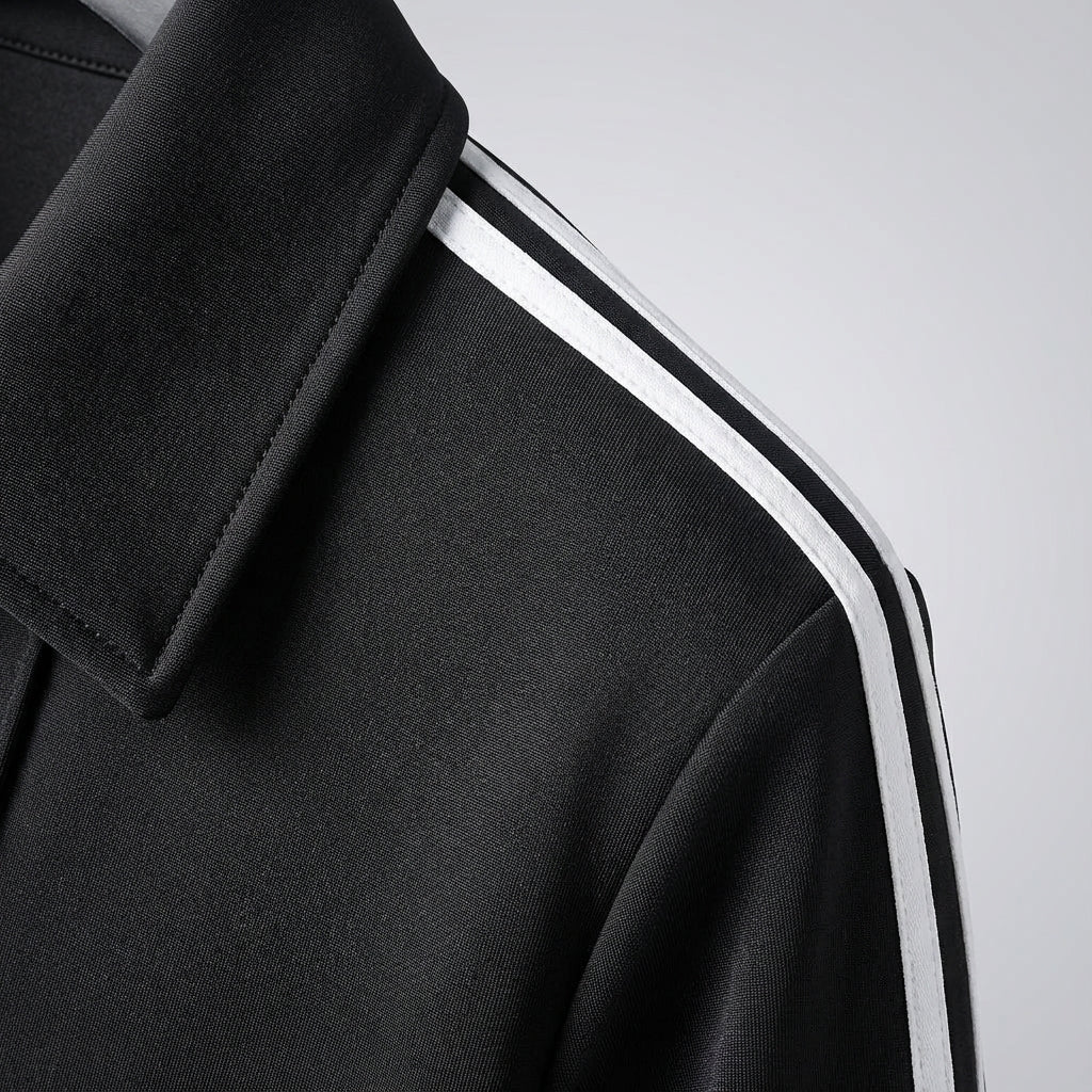 Zwart-wit heren trainingsjack Marshall, gevoerd. Stijlvolle sportkleding voor training en vrije tijd.