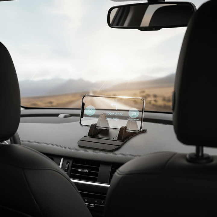 Siliconen antislip autohouder voor smartphone, zorgt voor een veilige grip op het dashboard zonder te verschuiven.