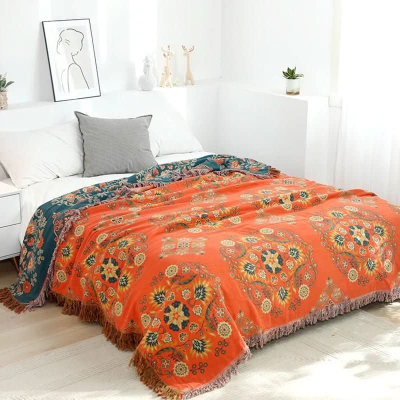 Zachte katoenen plaid in boho stijl, geel/oranje. Ideaal als slaapkamerdeken of gezellige woondeken.