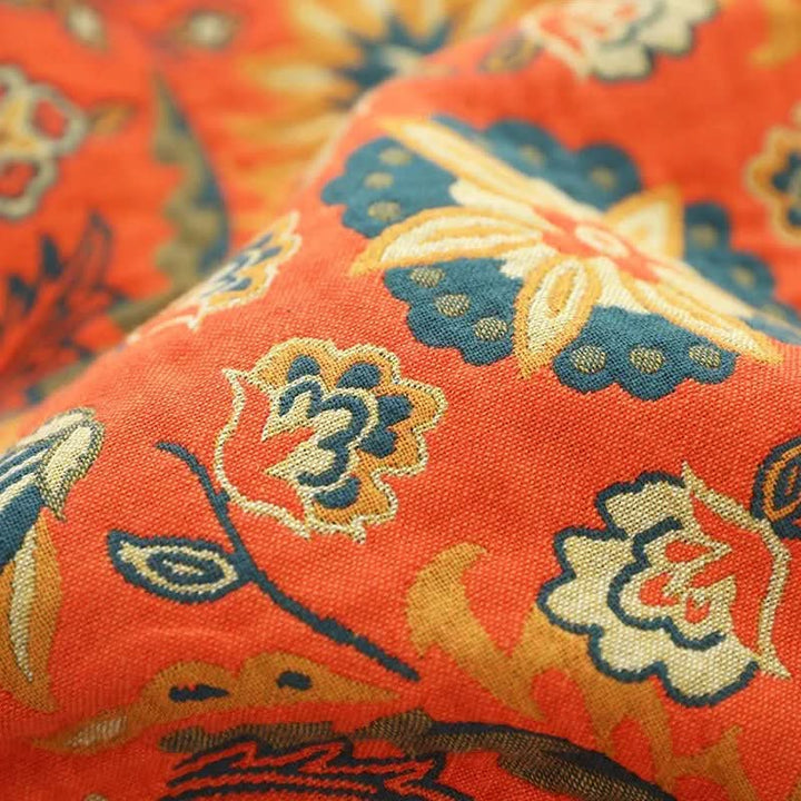 Gezellige geel-oranje boho sprei van katoen. Veelzijdig als woondeken of slaapkamer plaid met jacquard design.