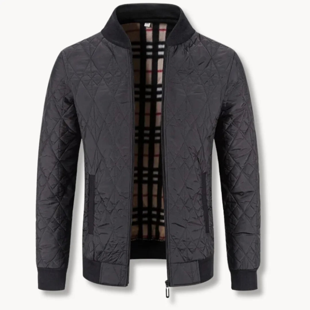 Comfortabel gewatteerd heren jack met ritssluiting, ronde hals en sportieve bomberstijl.