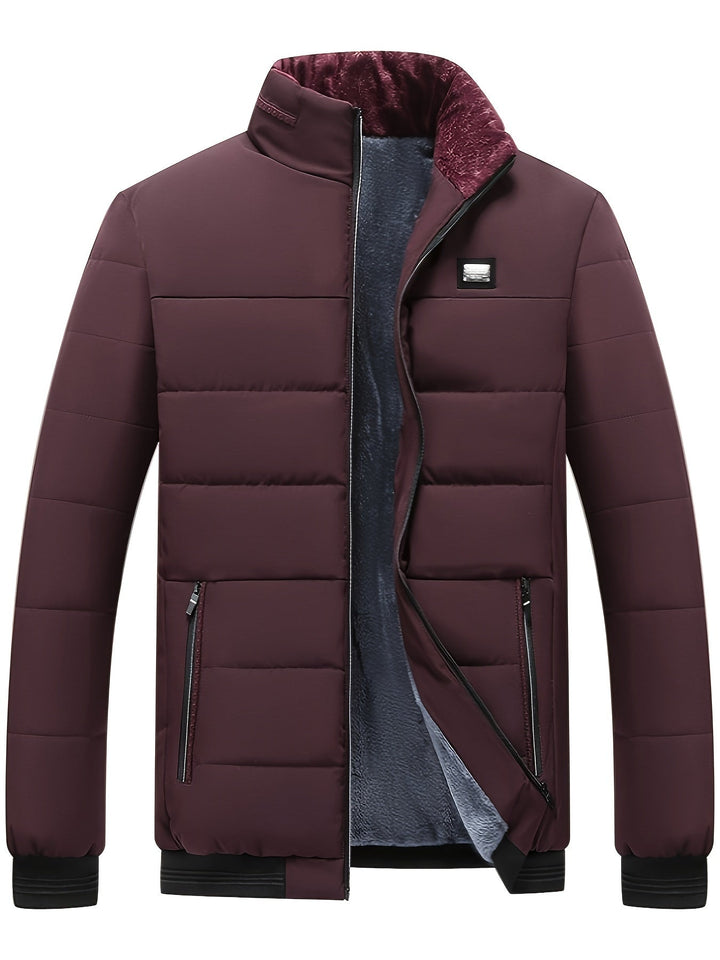 Zijaanzicht van de warme Joseph gewatteerde heren jas. Ideale buitenkleding voor een stijlvolle winterlook.