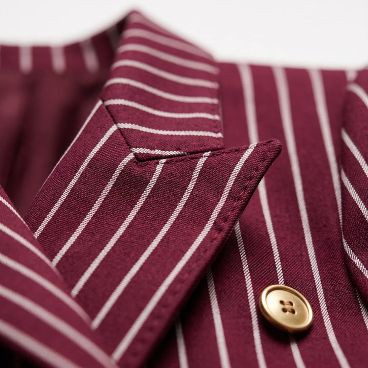 Elegant gestreept tweedelig dames broekpak met wijde pijpen, perfect voor office chic en dagelijks comfort.