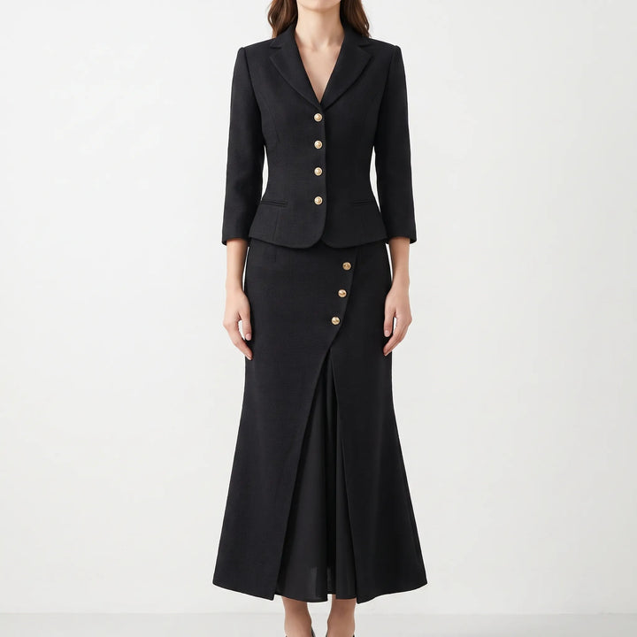 Model draagt een compleet getailleerd dames tweed rokpak, straalt professionaliteit en stijl uit.