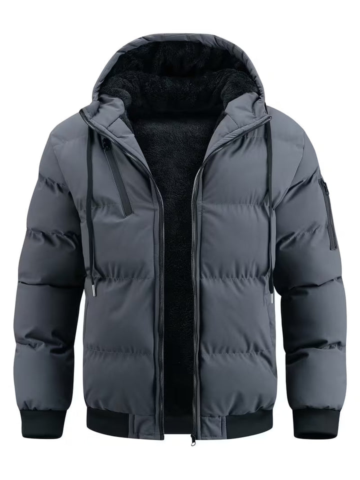 Grijze heren gewatteerde parka met capuchon en warme fleece voering voor de winter.